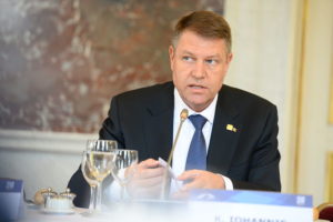 Iohannis says Romania should do more on defense